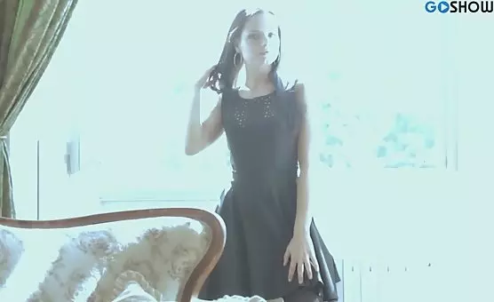 Seductive Brunette in Tempting Dress and Stockings